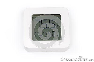 Digital indoor mini thermometer with hygrometer on a white surface Stock Photo