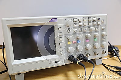 The digital oscilloscope on the desk Stock Photo