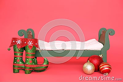 Digital Photography Background Of Green Vintage Christmas Baby Bed Isolated On Red Stock Photo