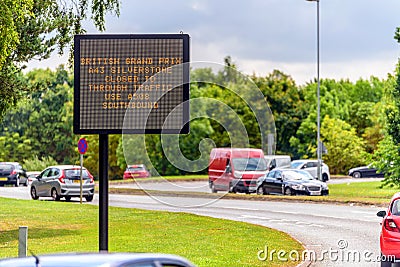 Digital road traffic information display message british grand prix silverstone on road in england uk Stock Photo