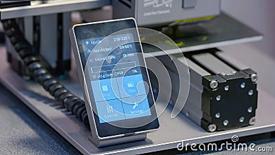 Digital sensor display screen of a working 3d printer. Stock Photo