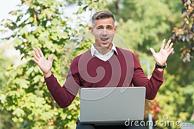 Digital solution for business. Green office. Businessman inspired by nature guy feel powerful to change world. Man Stock Photo