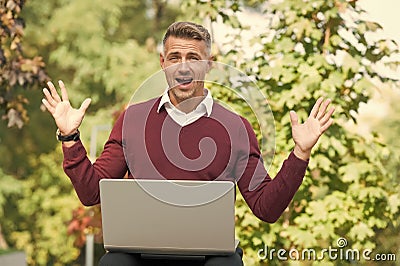 Digital solution for business. Green office. Businessman inspired by nature guy feel powerful to change world. Man Stock Photo