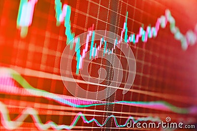 Digital stock market listing on a tablet screen. Financial graphs analysis Stock market reports. Stock market graph with screen. Stock Photo