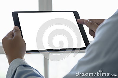 Digital tablet computer close up man using tablet hands man multitasking with isolated screen Stock Photo