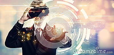 Digital Tech Circle with businessman using a virtual reality Stock Photo