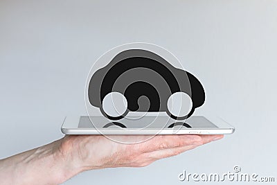 Digital transportation and mobility with car icon on tablet Stock Photo