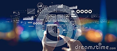 Digital Wallet theme with person using a smartphone at night Stock Photo