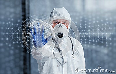 Digital world map on picture. Male doctor scientist in lab coat, defensive eyewear and mask standing indoors Stock Photo