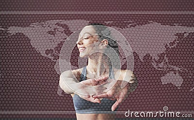 Digital world map on picture. Young woman with slim body shape in sportswear have fitness day indoors Stock Photo