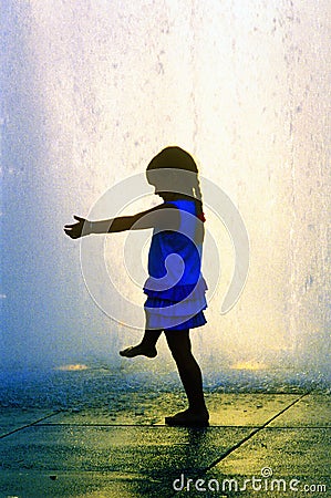 Digitally altered image of a little girl playing in fountain at Dorothy Chandler Pavilion, Los Angeles, CA Editorial Stock Photo