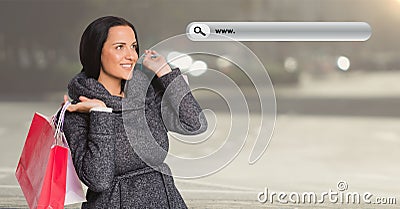 Digitally composite image of woman holding shopping bag and a search bar Stock Photo