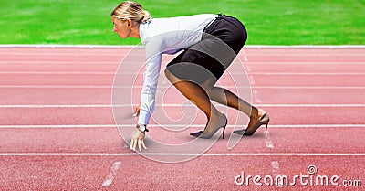 Digitally generated image of Businesswoman on starting point at racing track Stock Photo