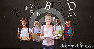 Digitally generated image of children holding books with letters flying against brown background Stock Photo