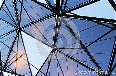 geometric design of the floors and the mesh against the sky Stock Photo