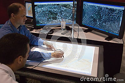 Digitizing maps at the ESRI user conference Editorial Stock Photo