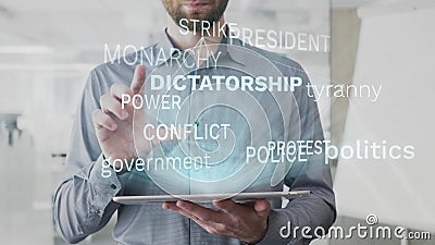 Diktatur, Politik, Tyrannei, Regierung, Protestwortwolke gemacht als Hologramm benutzt auf Tablette vom bärtigen Mann, auch stock footage Diktatur, Politik, Tyrannei, Regierung, Protestwortwolke gemacht als Hologramm benutzt auf Tablette vom bärtigen Mann, auch stock footage