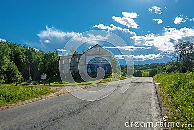 A dilapidated brick building near the road. Editorial Stock Photo