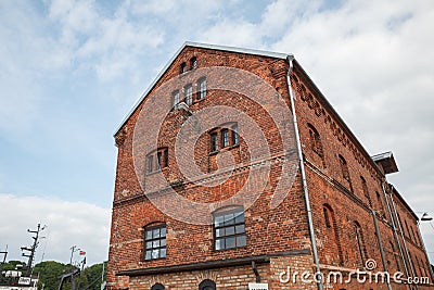 Dilapidated brick buildings on the streets of Liepaja Editorial Stock Photo