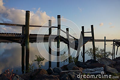 Dilapidated old fishing boat wharf ready for demolition Stock Photo
