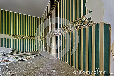 Destroyed room with wallpaper Stock Photo