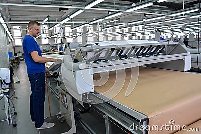 Large textile factory with valuable workers Editorial Stock Photo