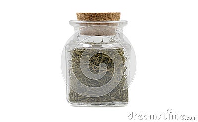 Dill in glass jar on isolated on white background. front view. spices and food ingredients Stock Photo