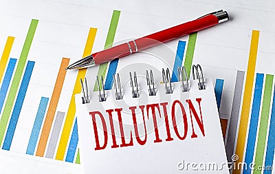 DILUTION text on a notebook with chart and pen business concept Stock Photo