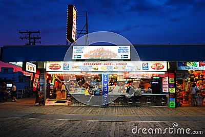 A diner remains open late on the Boardwalk Editorial Stock Photo