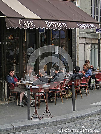 Diners enjoy a lunch at an outdoor bistro Editorial Stock Photo