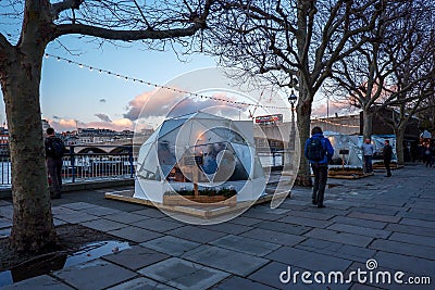 Diners in pop-up private `pods` / Igloos , London Editorial Stock Photo