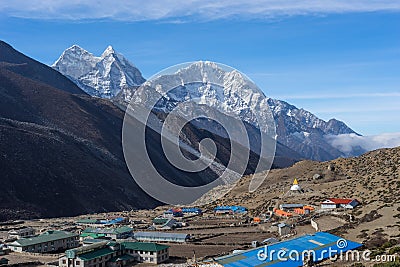 Dingboche village and Kangtega mountain peak in a morning, Everest region, Nepal Stock Photo