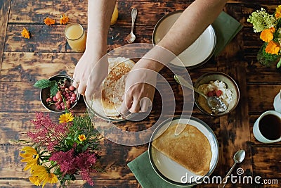 Man having healthy breakfast outside. Dining al fresco. Stock Photo