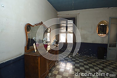 Dining room of an abandoned and old house Editorial Stock Photo