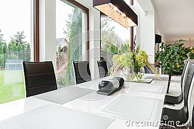 Dining room with long table Stock Photo