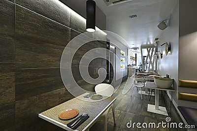 Dining room of a restaurant with square tables, white wood carpentry Stock Photo