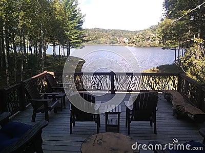Dinner on back deck overlooking sweetgrass lake Stock Photo