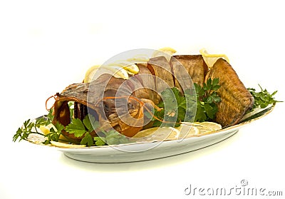 Dinner - bloated fresh-water catfish on the plate Stock Photo