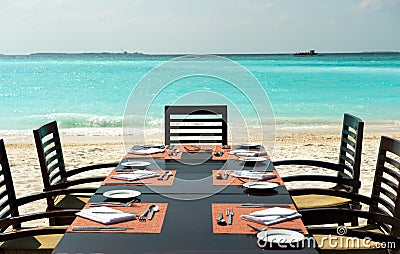 Dinner on exotic beach Stock Photo