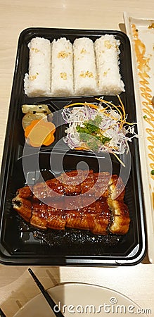 Dinner at a Japanese Restaurant with a very Delicious Unagi Bento Menu Stock Photo