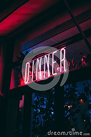 Dinner neon sign at night, in Manhattan, New York City Editorial Stock Photo