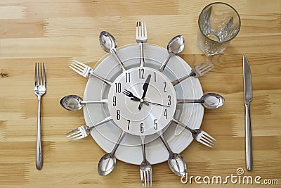 Dinner Plate Clock Table Stock Photo