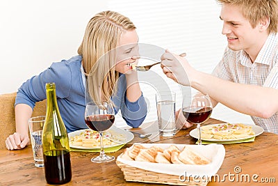 Dinner romantic couple enjoy wine eat pasta Stock Photo