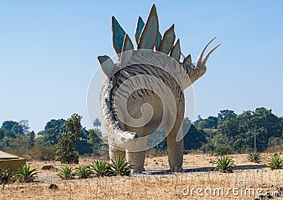 Dinosaur Stegosaurus effigy or Sculpture in the Forest Editorial Stock Photo