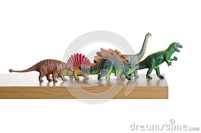 Dinosaurs walking off a ledge Stock Photo