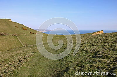 A dip in the hillside near Seatown in Dorset, situated on the coastal path on the Jurassic coast between Charmouth and West Bay Stock Photo