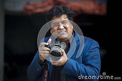 Dipankar Dipon, One of the most popular Modern Film Director & Screenwriter is taking pictures Editorial Stock Photo