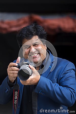 Dipankar Dipon, One of the most popular Modern Film Director & Screenwriter is taking pictures Editorial Stock Photo