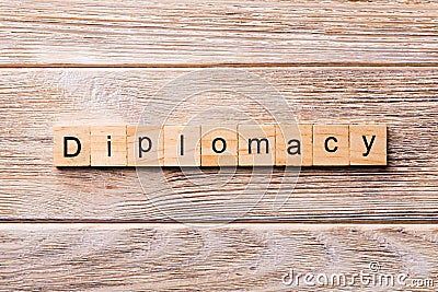 Diplomacy word written on wood block. diplomacy text on wooden table for your desing, concept Stock Photo