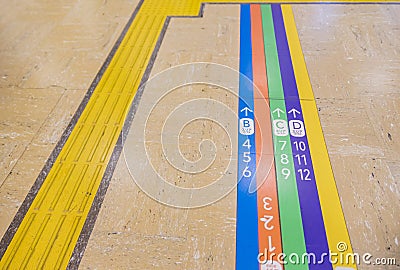 Direction guide label on the floor ofShinjuku expressway bus terminal Editorial Stock Photo